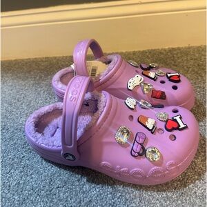 Brand New. Enjoy a Pair of Women's Crocs Lined Lavander Color Size 8